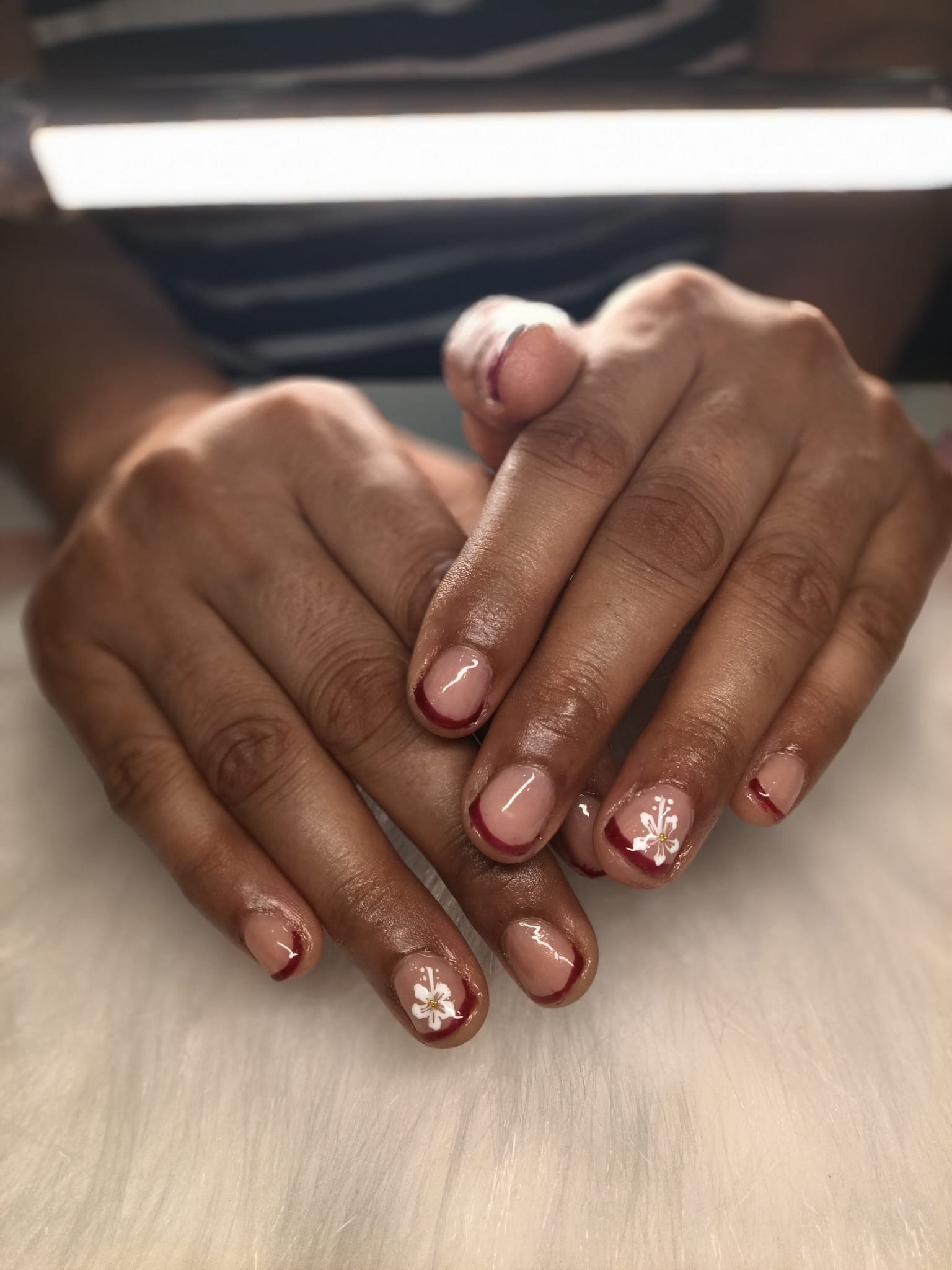 Burgundy Velvet & Floral Bloom — Sets by Ginni nail set worn on hands