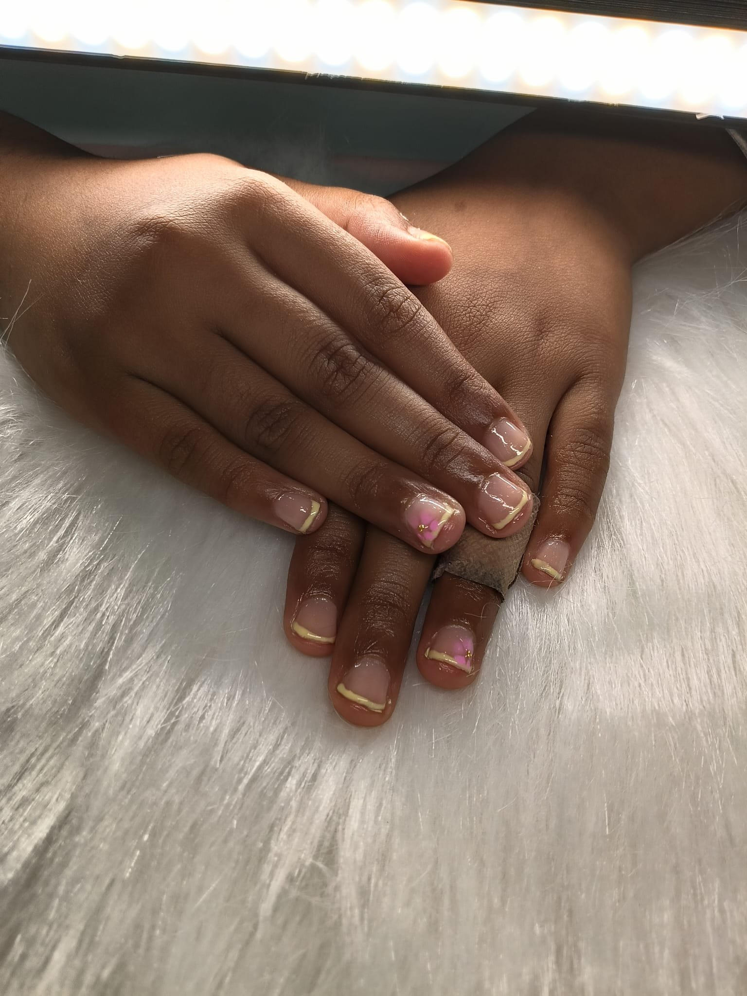 Pastel Lemon & Pink Fleur — Sets by Ginni nail set worn on hands
